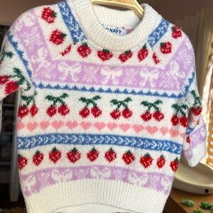 Old Navy baby White Sweater with Red fruit and Purple bow Patterns